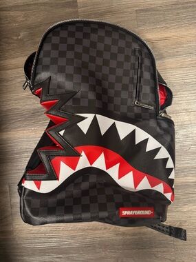Sprayground Black Checker Shark Backpack with Red & White Shark Mouth